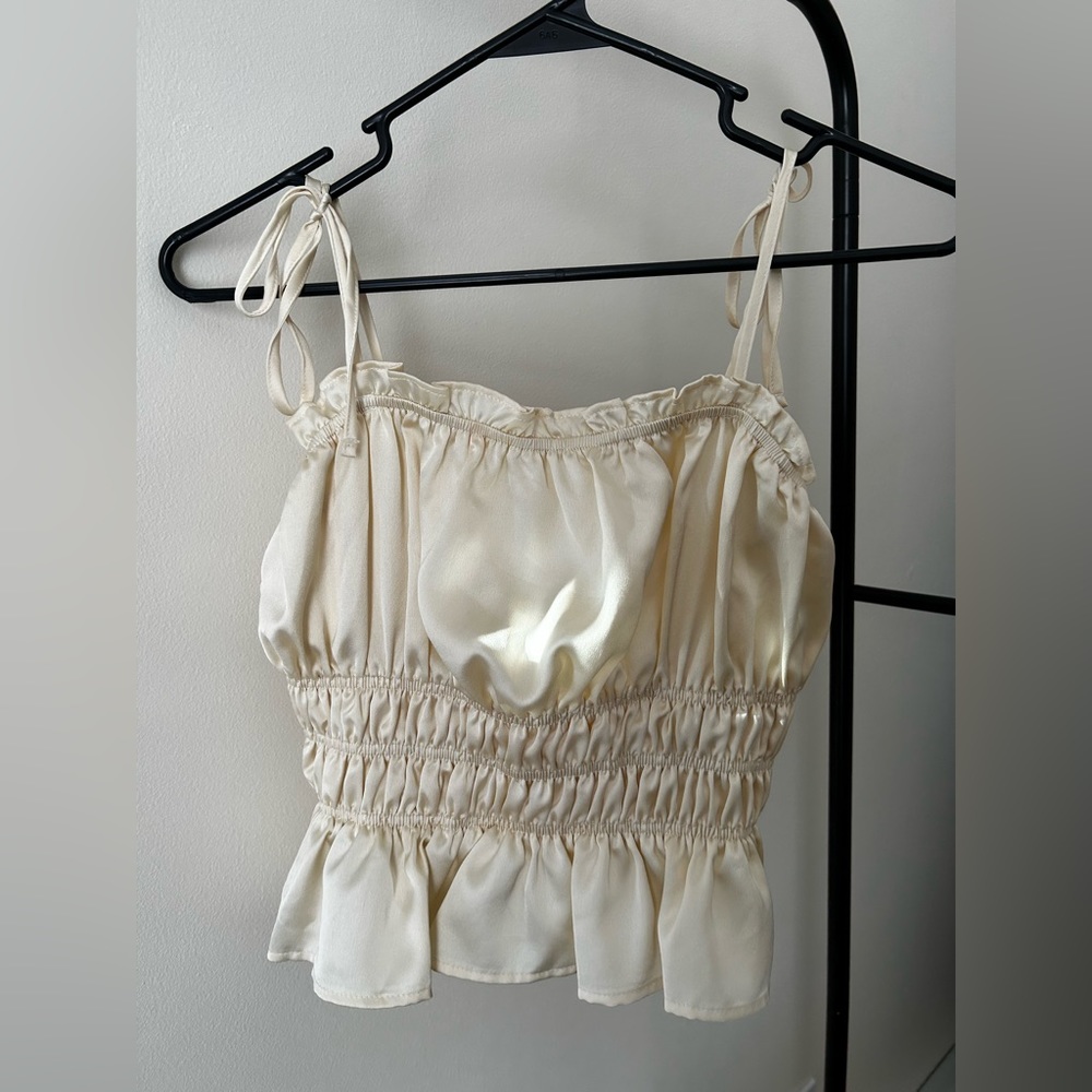 Elegant, cream colored tie tank top